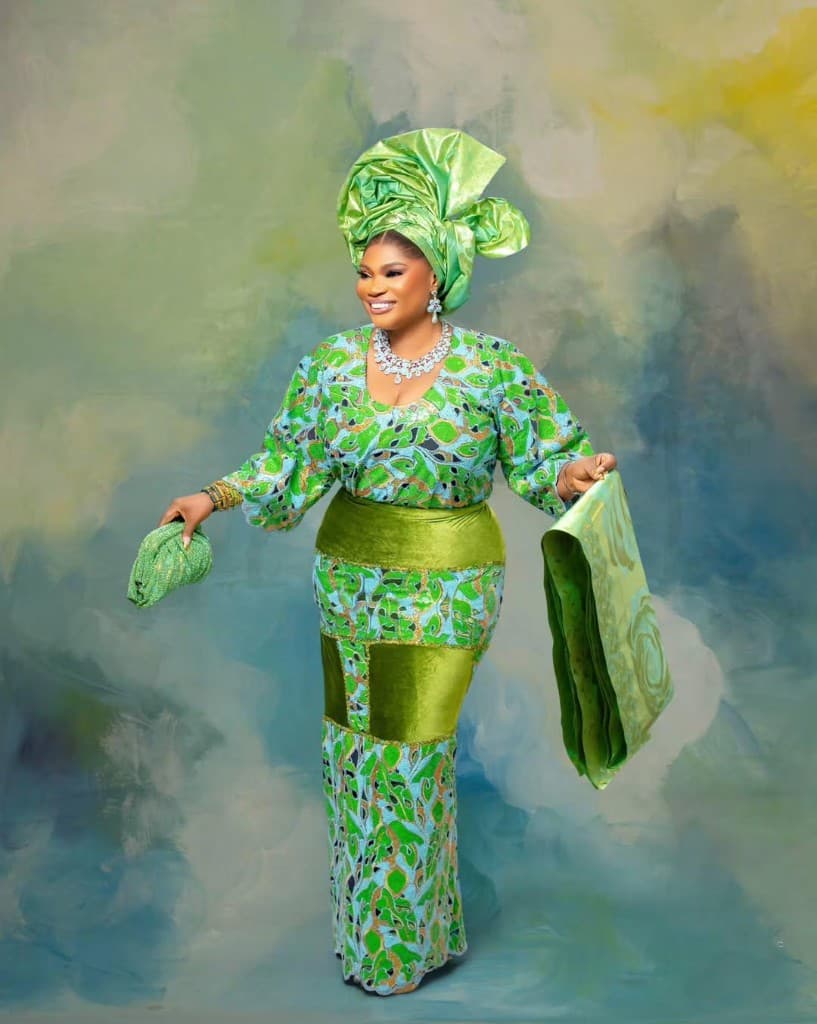 Lime green Iro and Buba styled with a matching gele and embroidered sash